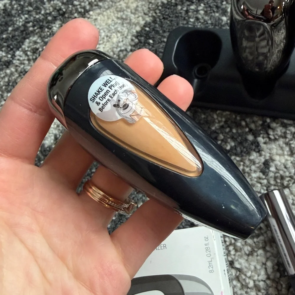Temptu 2.0 airbrush makeup system includes airbrush, compressor, new bronzer